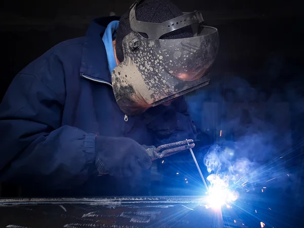 Welder on the industrial workplace — Stock Photo, Image