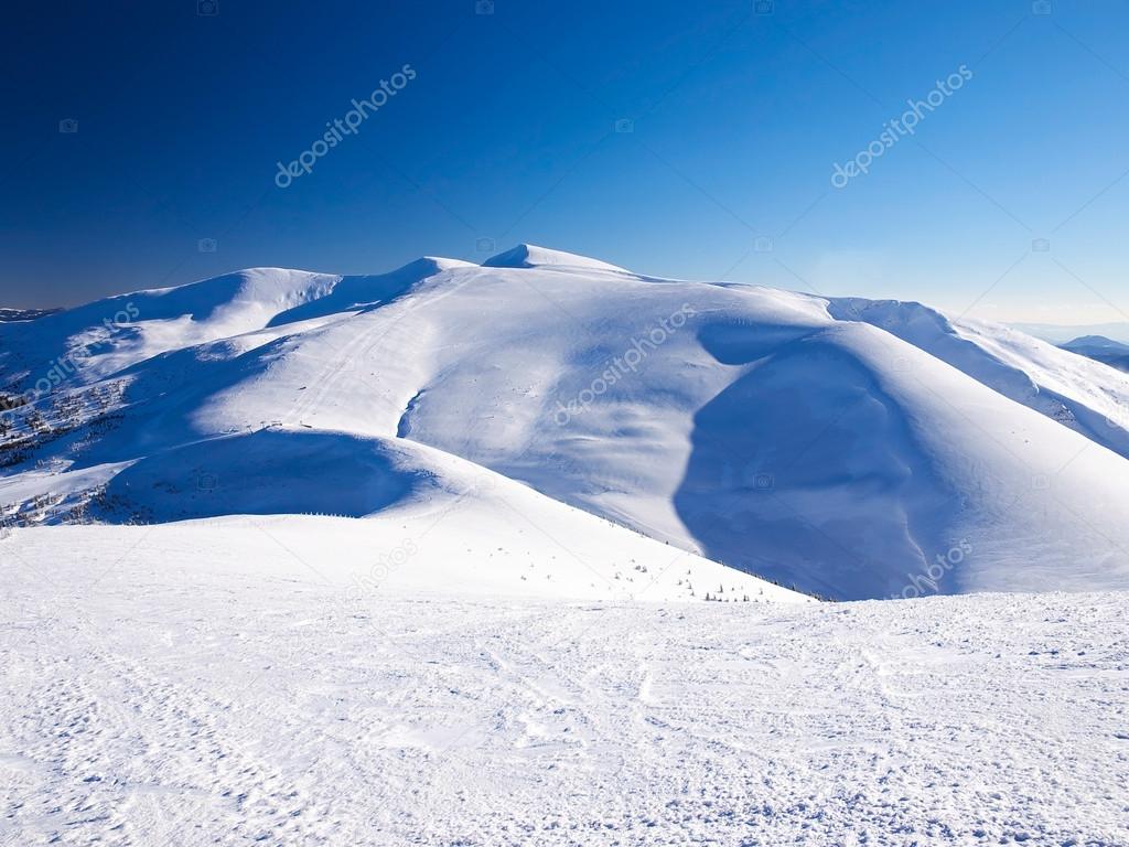 Snowy hills Stock Photo by ©biletskiy_e 46873181