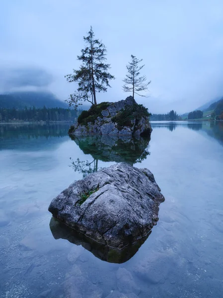 Lake Hintersee, Germany. Landscape during fog. Lake and trees. High-resolution photo