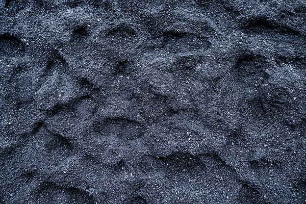 Schwarzer Sand Als Hintergrund Foto Für Das Design Fußabdrücke Sand — Stockfoto