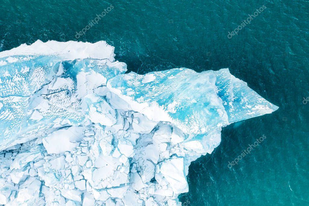 Iceland. An aerial view of an iceberg. Winter landscape from a drone. Iceberg Lagoon. National Park, Iceland. Traveling along the Golden Ring in Iceland.