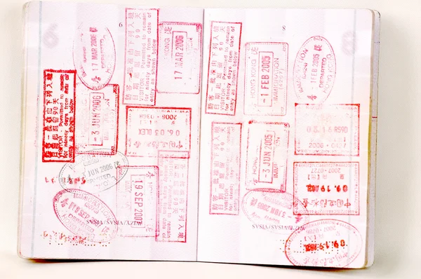 Hongkong and China stamps in passport — Stock Photo, Image