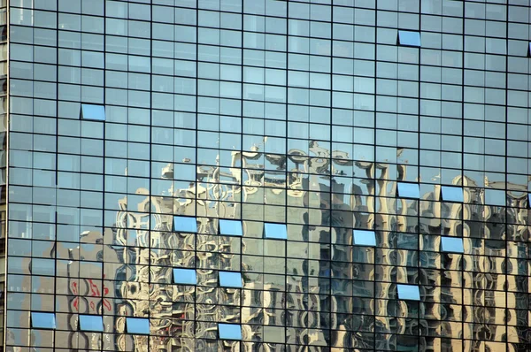 Skyscrapers in reflection — Stock Photo, Image