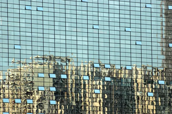 Skyscrapers in reflection — Stock Photo, Image