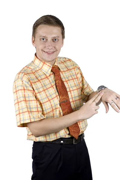 Hombre de negocios sonriendo, mostrando el reloj —  Fotos de Stock