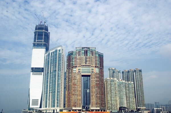 Hongkong, Kowloon, modern buildings, residential area at the harbour, near sea-side.