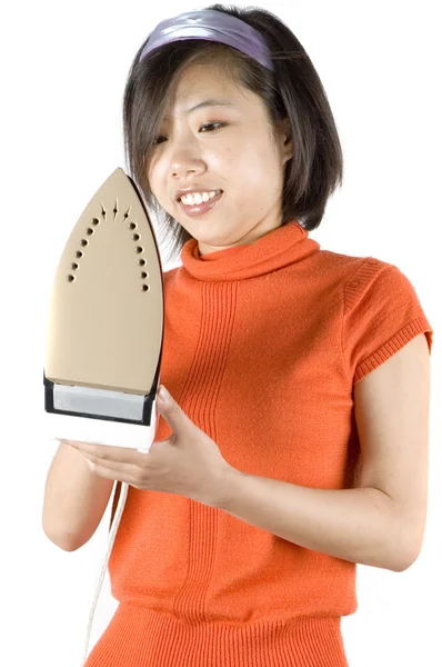 Young girl with iron — Stock Photo, Image