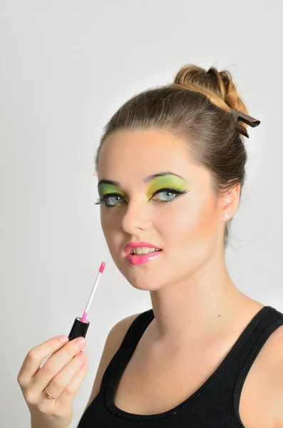 Meisje met lipgloss — Stockfoto