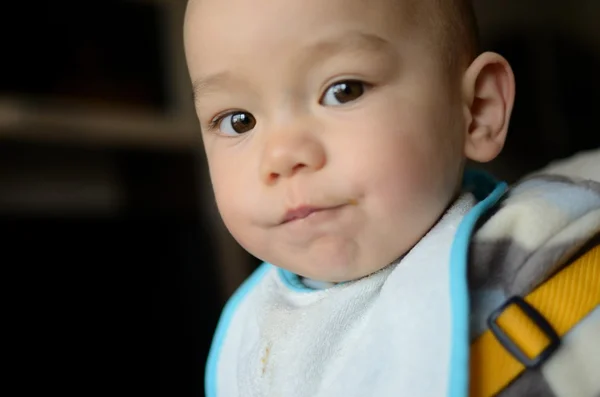 Boy in feeding chair — Stock Photo, Image