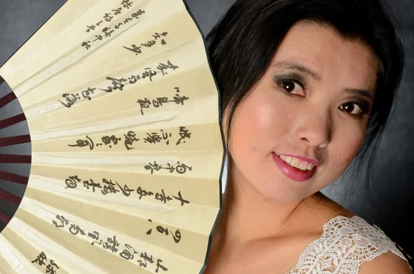 Chinese lady with fan — Stock Photo, Image