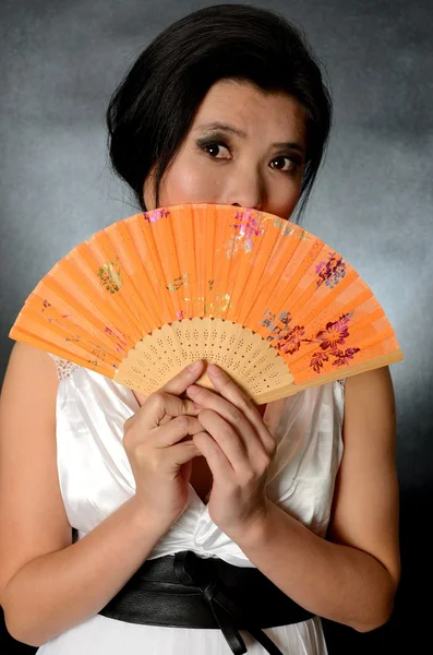 Chinese lady with fan Stock Photo