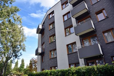Facade of building, windows and balconies. Modern apartments in Poland. Estate in Wroclaw city, Poland.