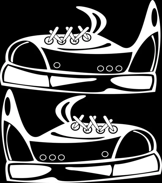Zapatos juveniles aislados sobre fondo negro —  Fotos de Stock