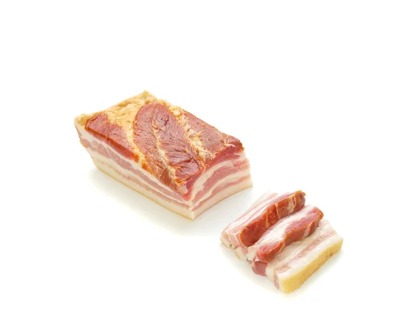 Big Part Bacon and Slices in Front — Stock Photo, Image