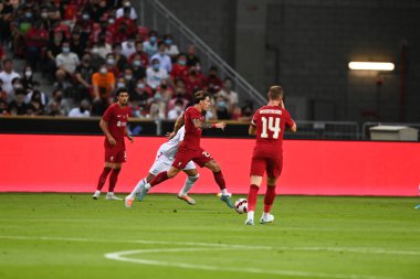 KALLANG, SINGAPORE - 15 Temmuz 2022: Kostas Tsimikas # 21 Liverpool Oyuncusu Ulusal Stadyumdaki Crystal Palace 'a karşı sezon öncesi maçında