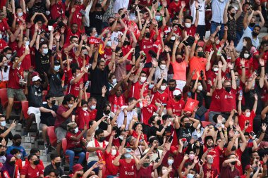 KALLANG, SINGAPORE - 15TH JULY, 2022: Human wave from Unidentified fan of Liverpool during pre-season against Crystal Palace at national stadium
