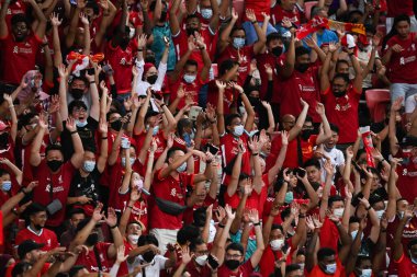 KALLANG, SINGAPORE - 15TH JULY, 2022: Human wave from Unidentified fan of Liverpool during pre-season against Crystal Palace at national stadium