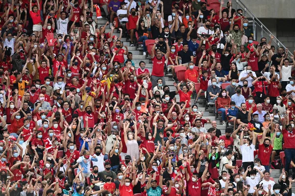 KALLANG, SINGAPORE - 15TH JULY, 2022: Human wave from Unidentified fan of Liverpool during pre-season against Crystal Palace at national stadium