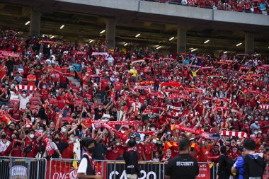 Kallang-Singapore-15JUL2022-Unidentified fan of liverpool in action during pre-season against crystal palace at national stadium,singapore