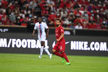 KALLANG, SINGAPORE - 15 Temmuz 2022: Mohamed Salah # 11 Liverpool Oyuncusu sezon öncesi stadyumdaki kristal saraya karşı eylem halinde. 