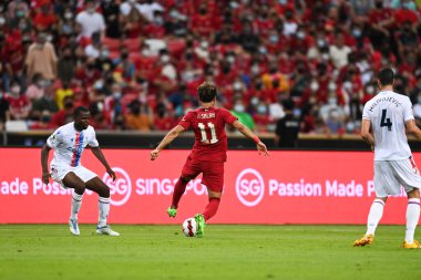 KALLANG, SINGAPORE - 15 Temmuz 2022: Mohamed Salah # 11 Liverpool Oyuncusu sezon öncesi stadyumdaki kristal saraya karşı eylem halinde. 