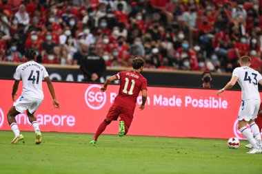 KALLANG, SINGAPORE - 15 Temmuz 2022: Mohamed Salah # 11 Liverpool Oyuncusu sezon öncesi stadyumdaki kristal saraya karşı eylem halinde. 