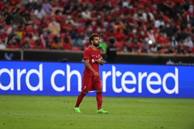 KALLANG, SINGAPORE - 15 Temmuz 2022: Mohamed Salah # 11 Liverpool Oyuncusu sezon öncesi stadyumdaki kristal saraya karşı eylem halinde. 