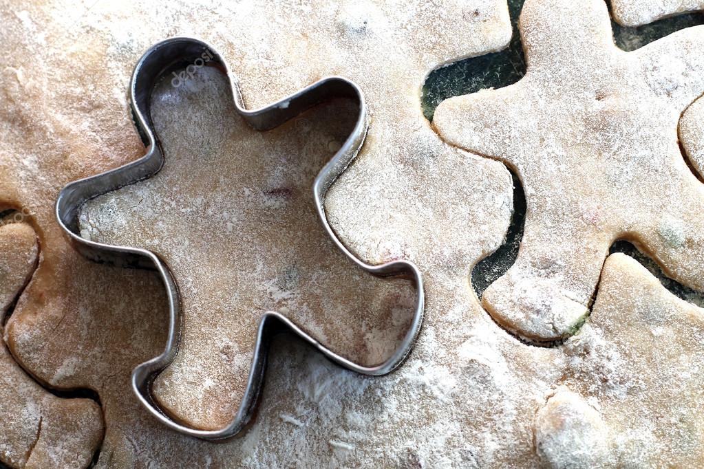 Gingerbread man cookies with copper cookie cutter