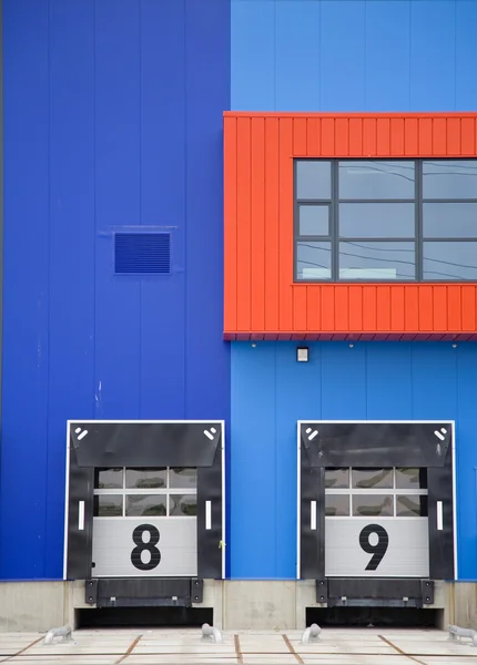 Loading bay with numbers for loading and unloading trucks — Stock Photo, Image