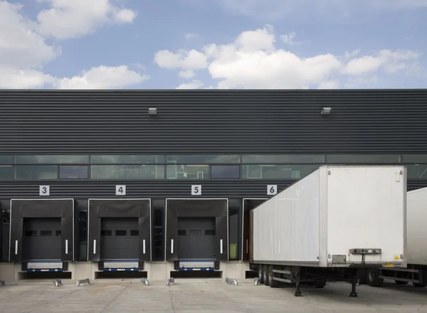 Loading bay with numbers for loading and unloading trucks — Stock Photo, Image