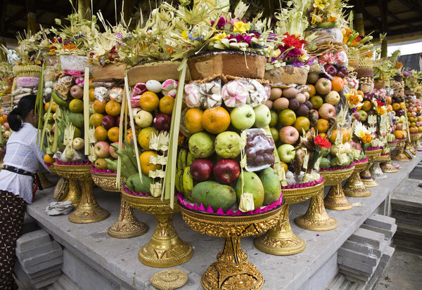 Preparing offerings for a temple ceremony in Bali