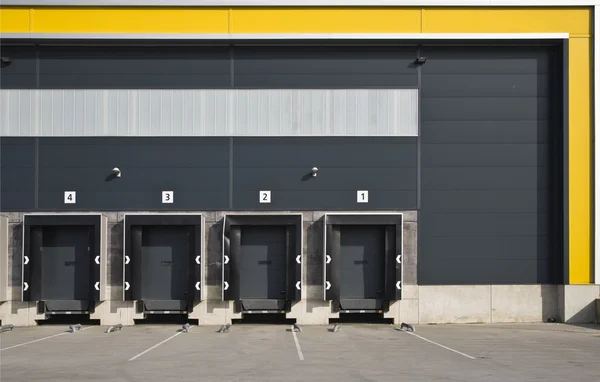 Loading bay with numbers for loading and unloading trucks — Stock Photo, Image