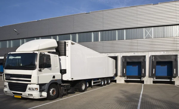 Loading bay with numbers for loading and unloading trucks — Stock Photo, Image