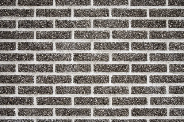 Fechar a imagem de um fundo de parede de tijolo — Fotografia de Stock
