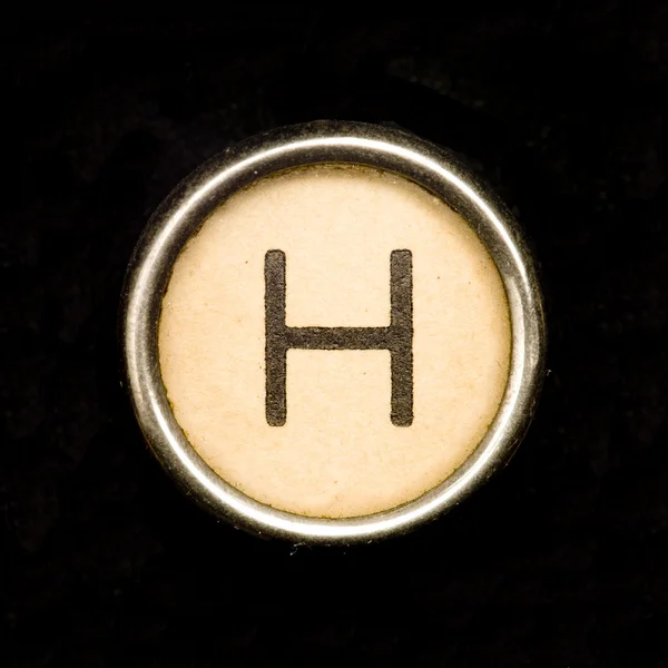 Die h-Taste auf einem kompletten Alphabet einer antiken Schreibmaschine — Stockfoto