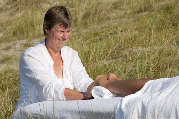 Massage in the dunes on the island Ameland, the Netherlands — Stock Photo, Image