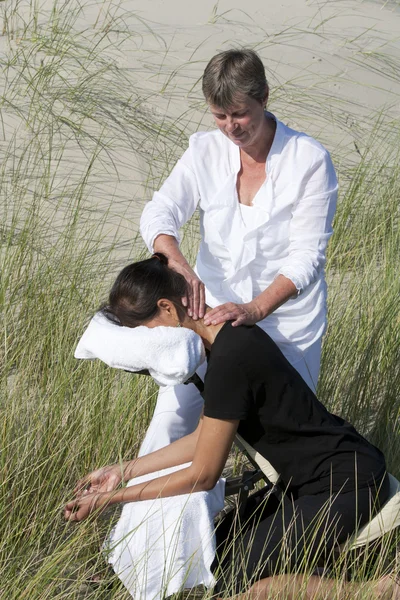 Chair massage in the dunes on the island Ameland, the Netherlands — Stock Photo, Image