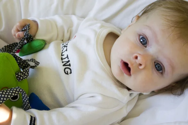 Baby playing with soft toy — Stock Photo, Image