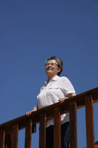 Senior lady enjoying the sun — Stock Photo, Image