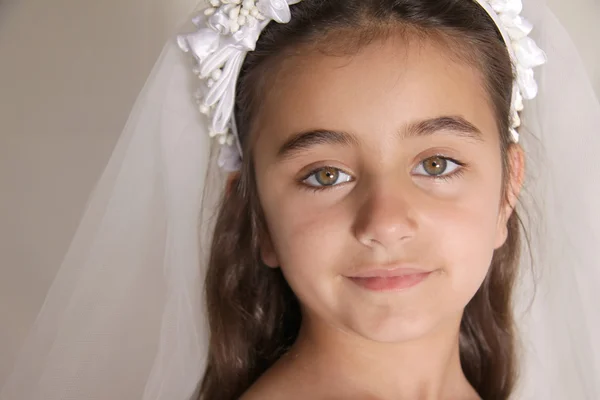 Close up of girl dressed for her first communion — Stock Photo, Image