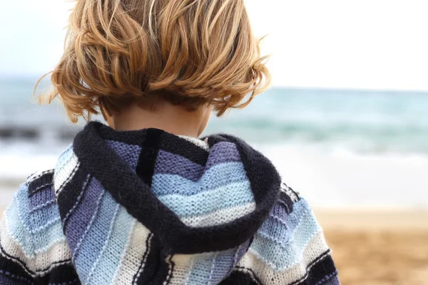 Little girl with back to camera