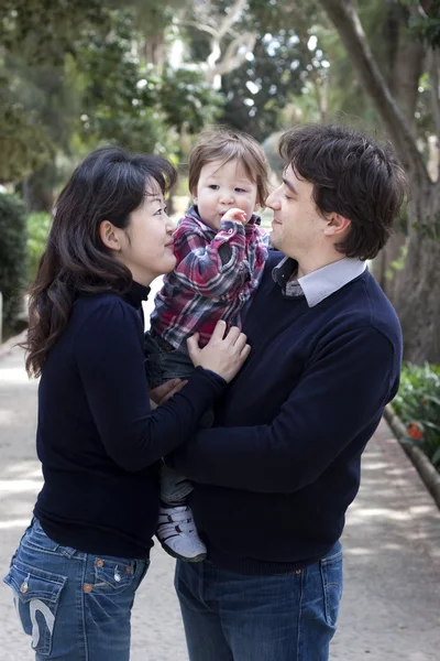 Mixed race asian caucasian family — Stock Photo, Image