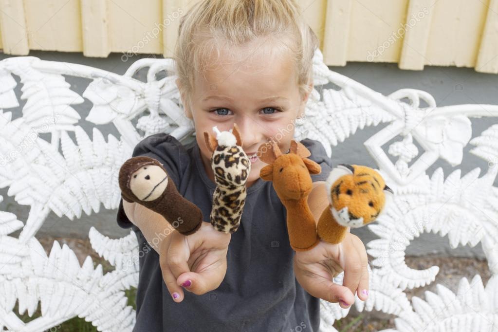 Child with finger puppets