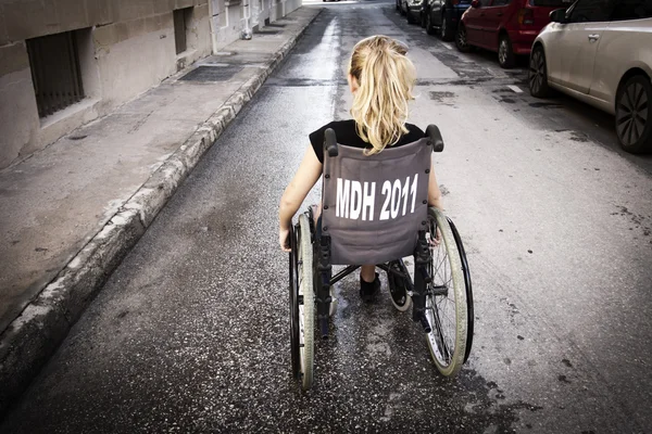 Lonely child in wheelchair — Stock Photo, Image