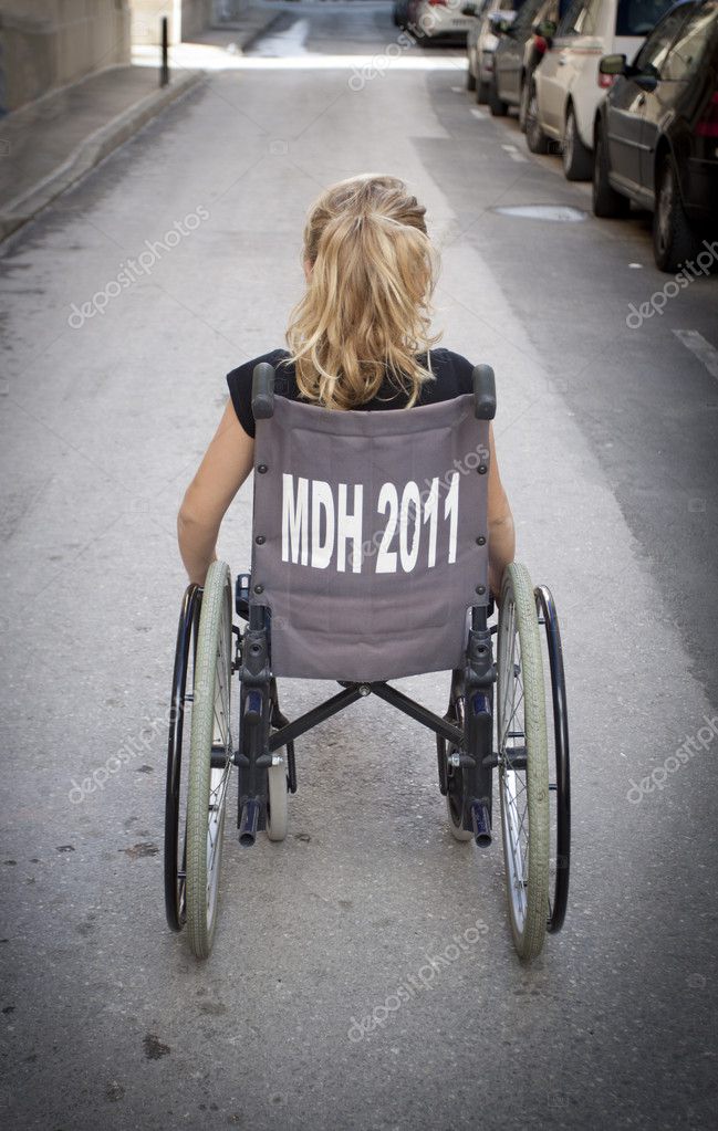 Child alone in wheelchair Stock Photo by ©Annems 35606797