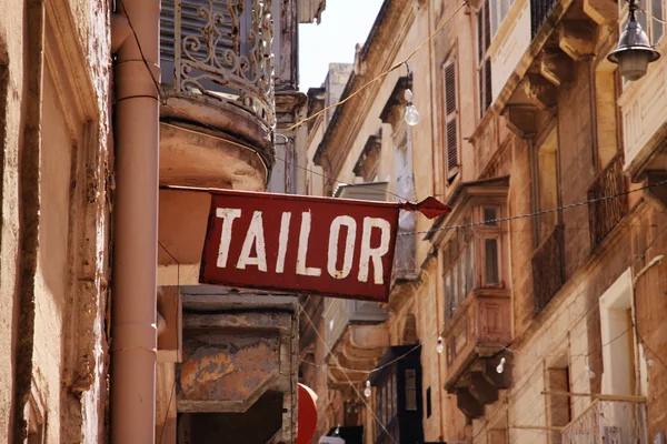 Sign reading Tailor in Valletta, capital city of Malta — Stock Photo, Image