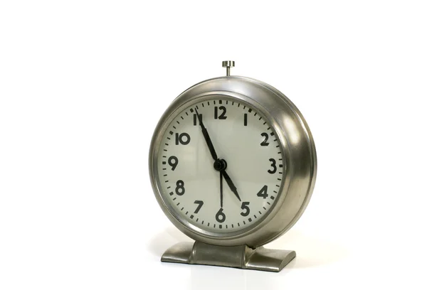 Brushed metal alarm clock on white — Stock Photo, Image
