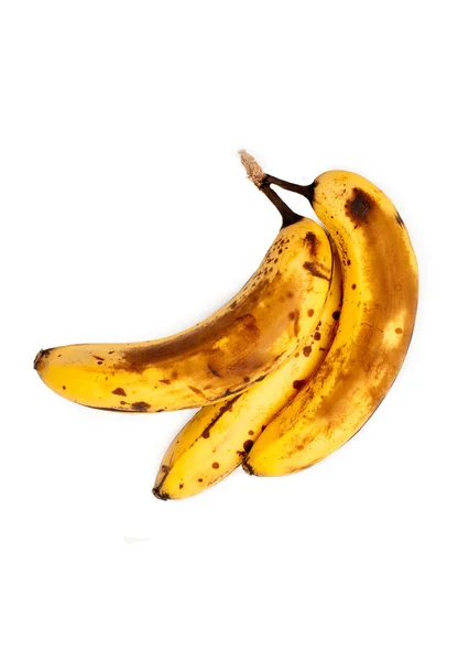 Na białym tle nad dojrzałe banany — Zdjęcie stockowe
