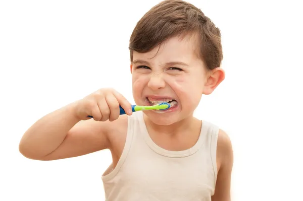 Boy brushing teeth isolated — Stock Photo, Image