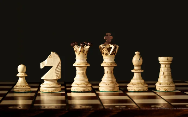 Chess pieces on board — Stock Photo, Image